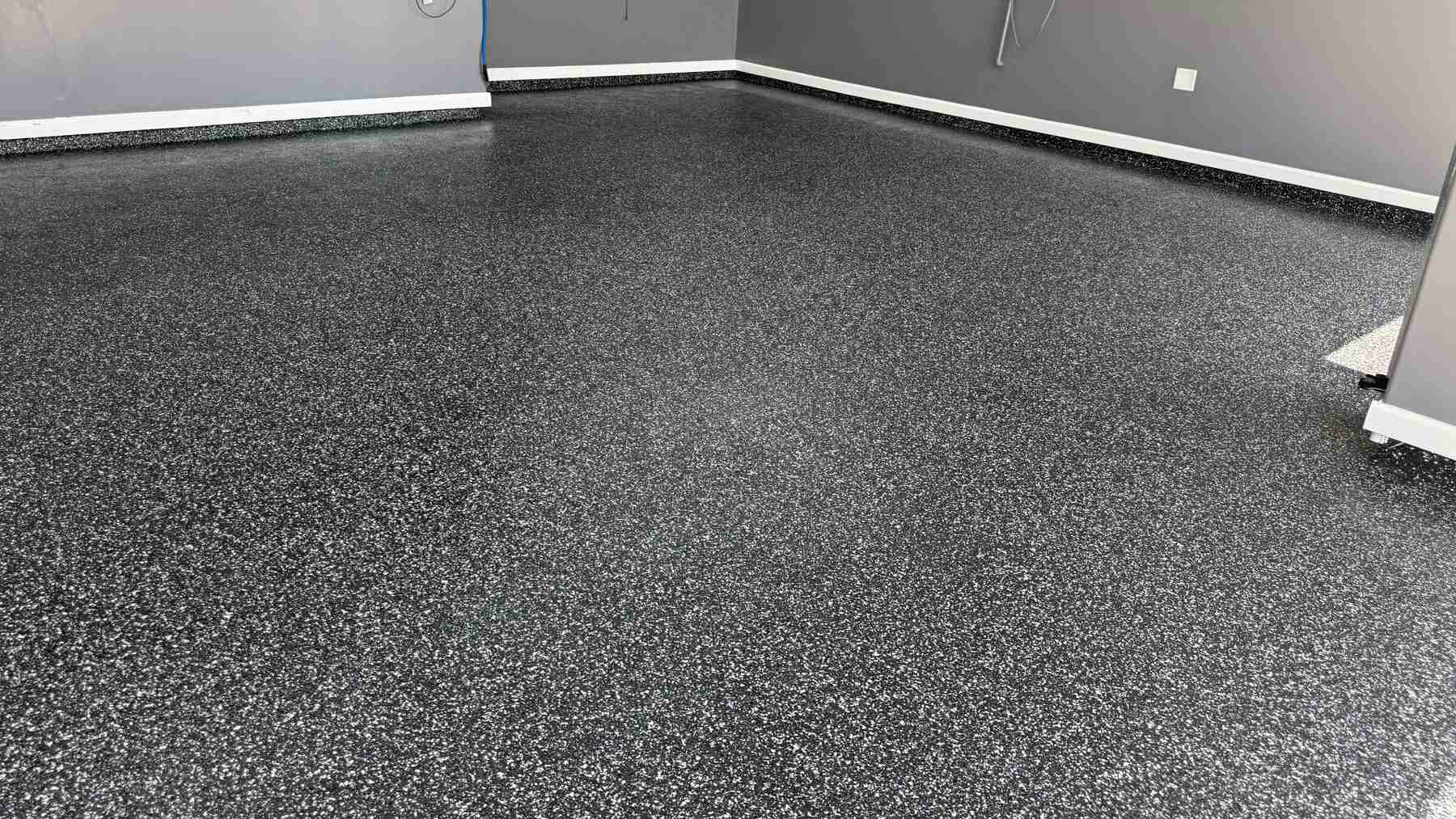 Equipo de AM Epoxy & Garage trabajando en Houston, TX